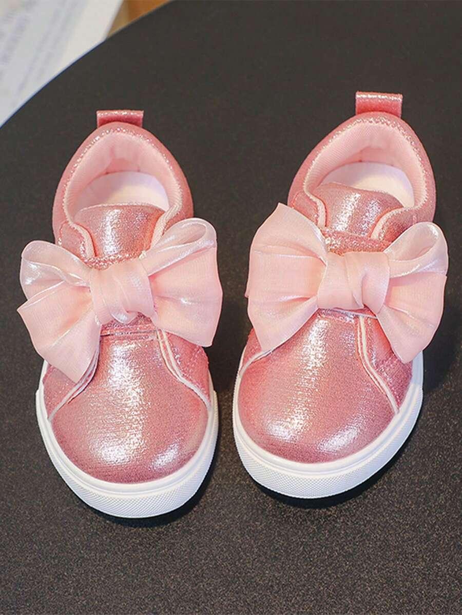 różowe buty sportowe