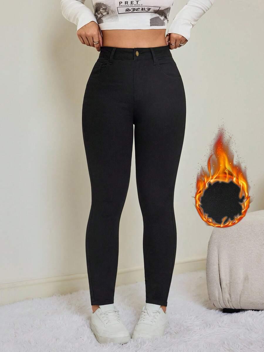czarne ocieplane spodnie jeans