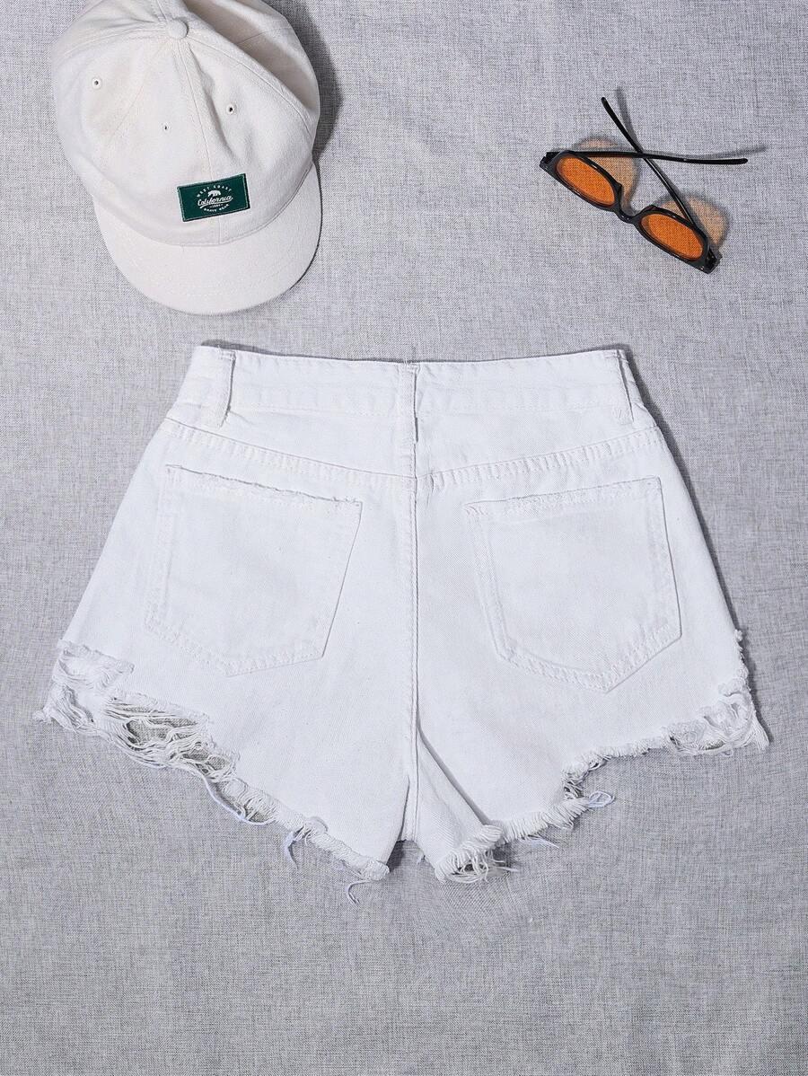 białe krótkie spodenki ripped jeans