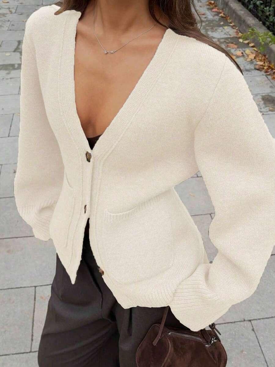 Beżowy sweter kieszonki