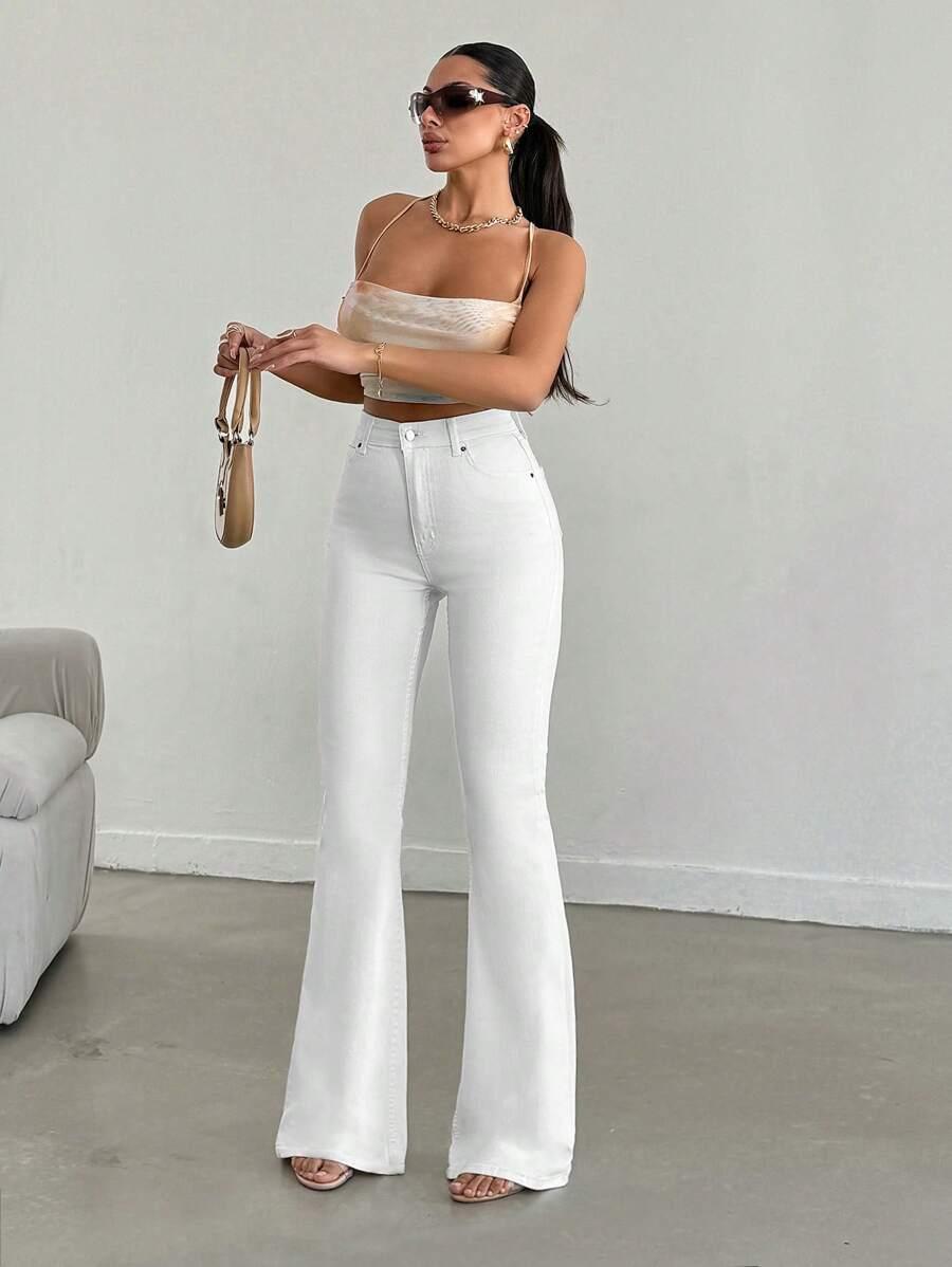 BIAŁE SPODNIE JEANS