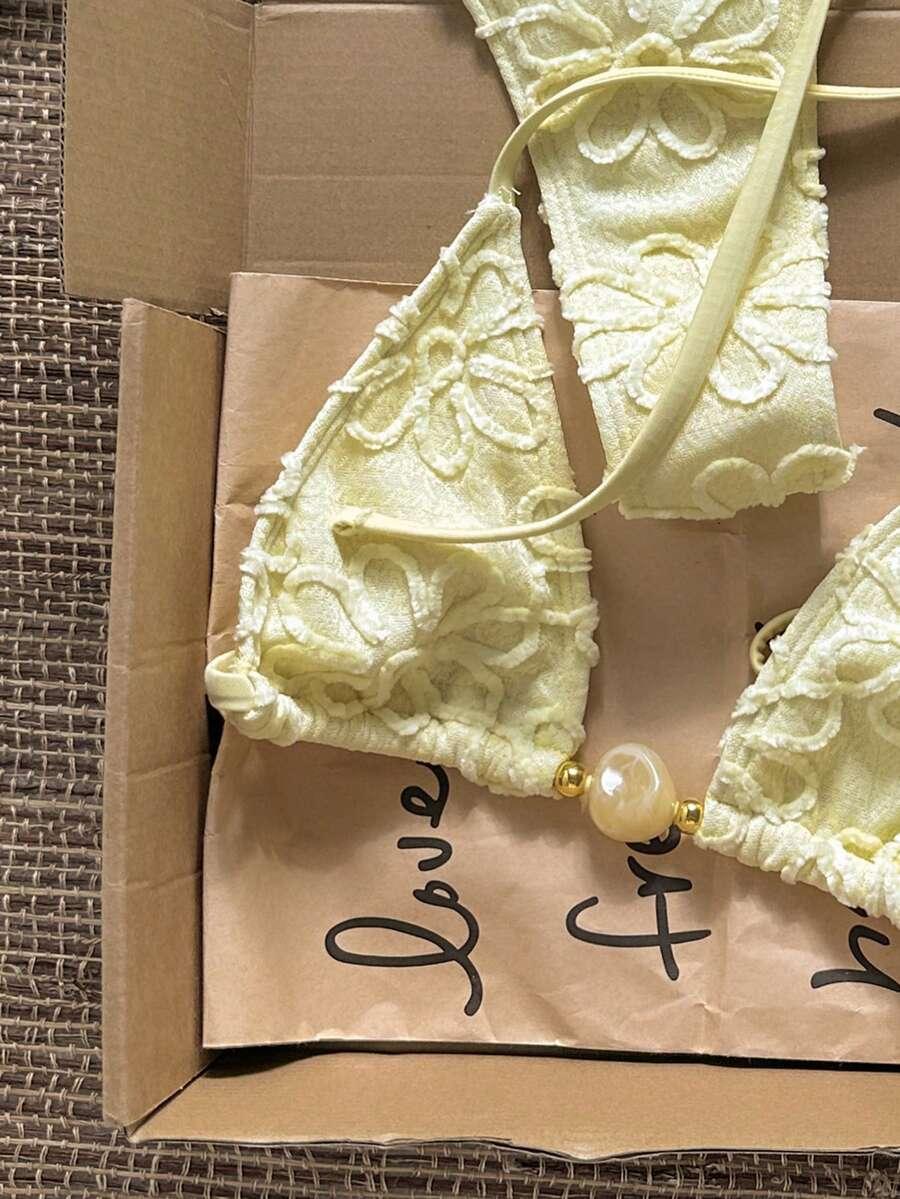 żółty dwuczęściowy strój kąpielowy kwiaty