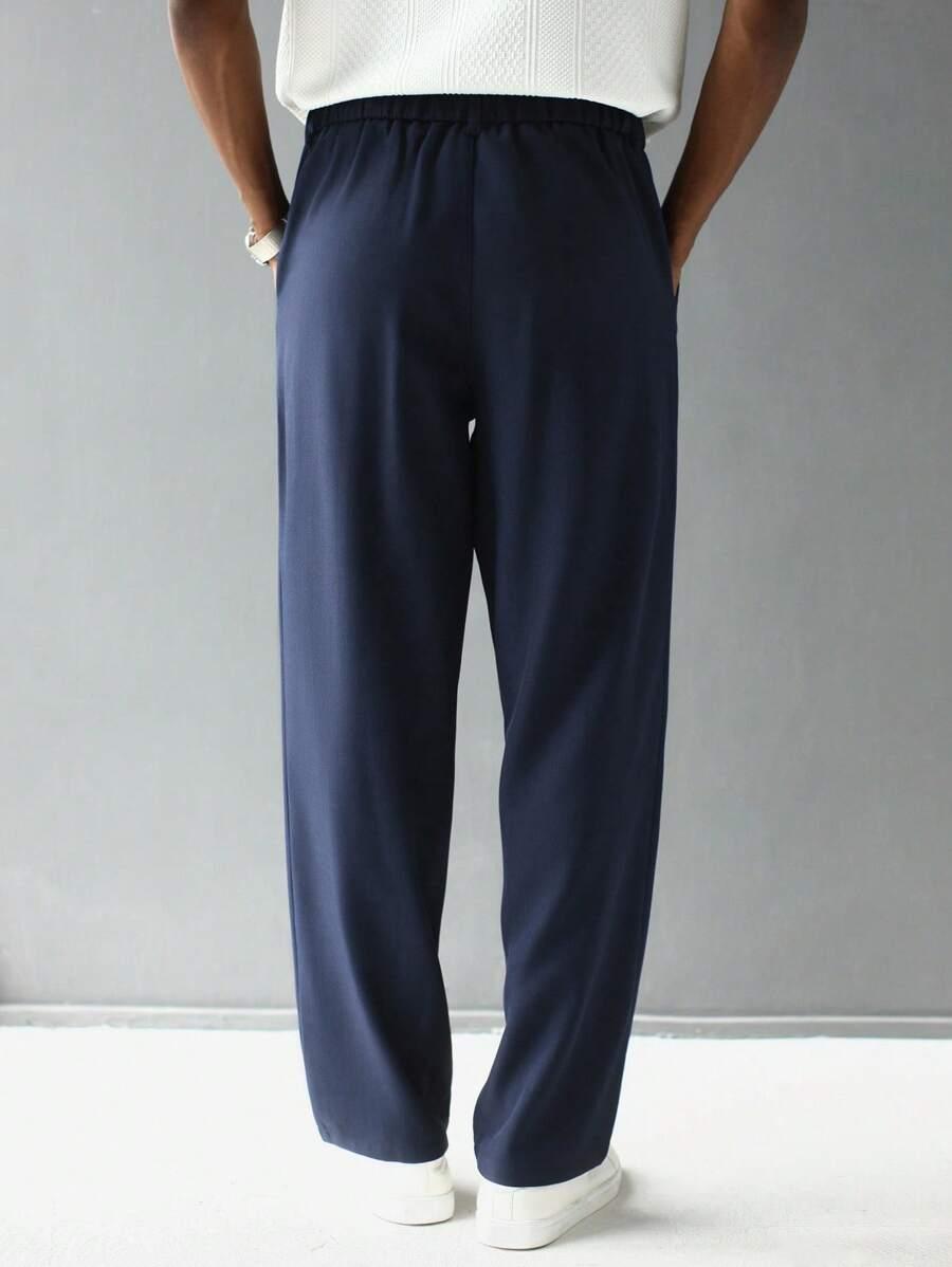 granatowe spodnie casual