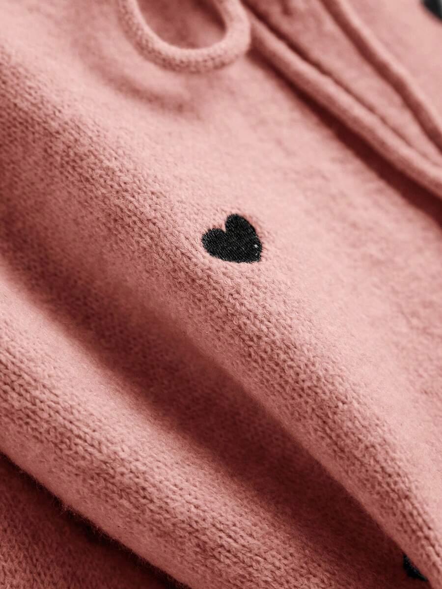 różowy sweter wiązanie