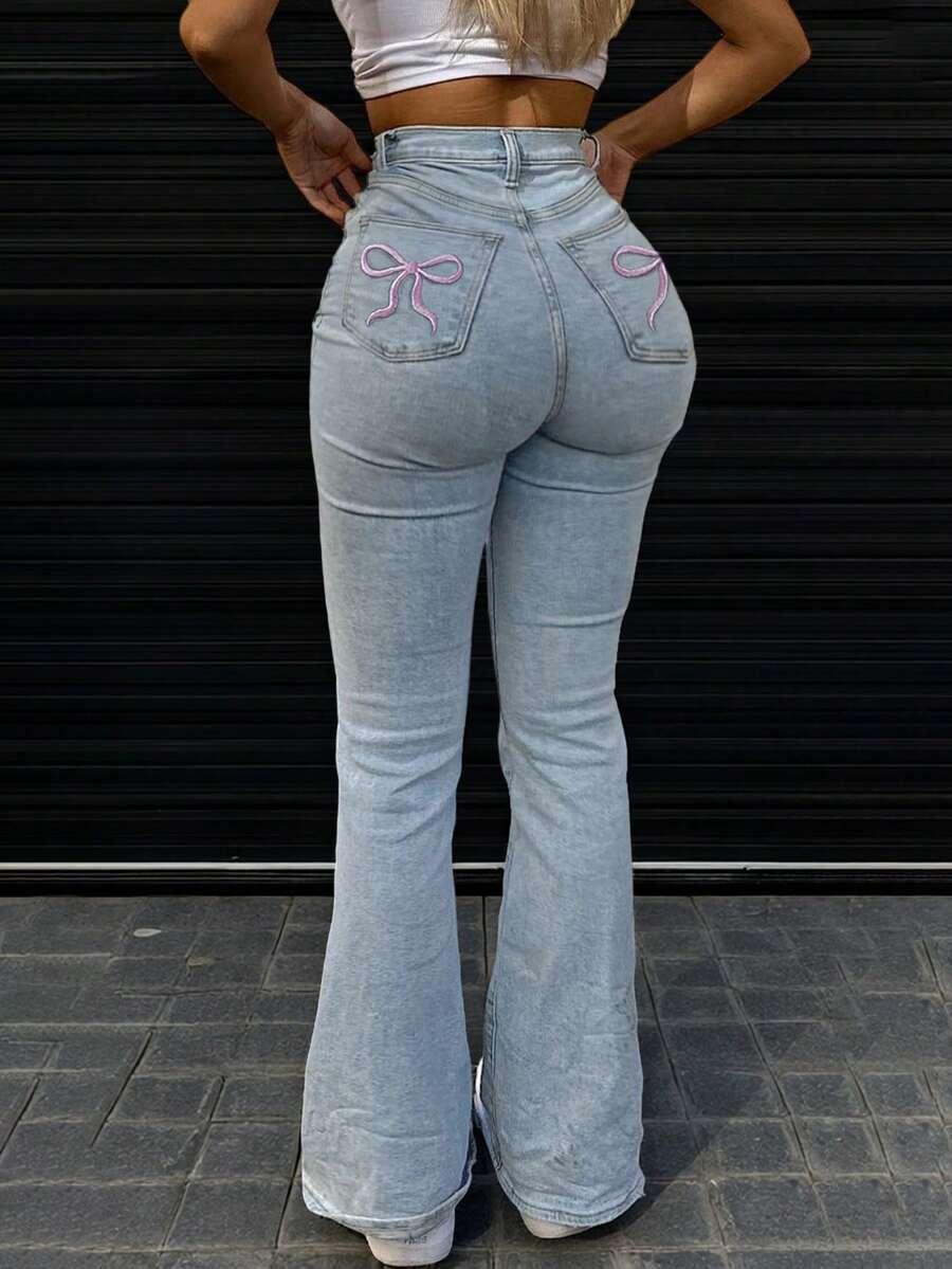 niebieskie jeansy dzwony kieszenie 
