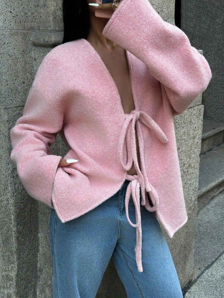 różowy sweter wiązanie