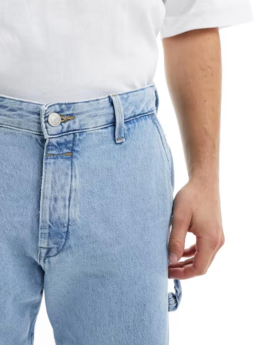 niebieskie spodnie jeans kieszenie