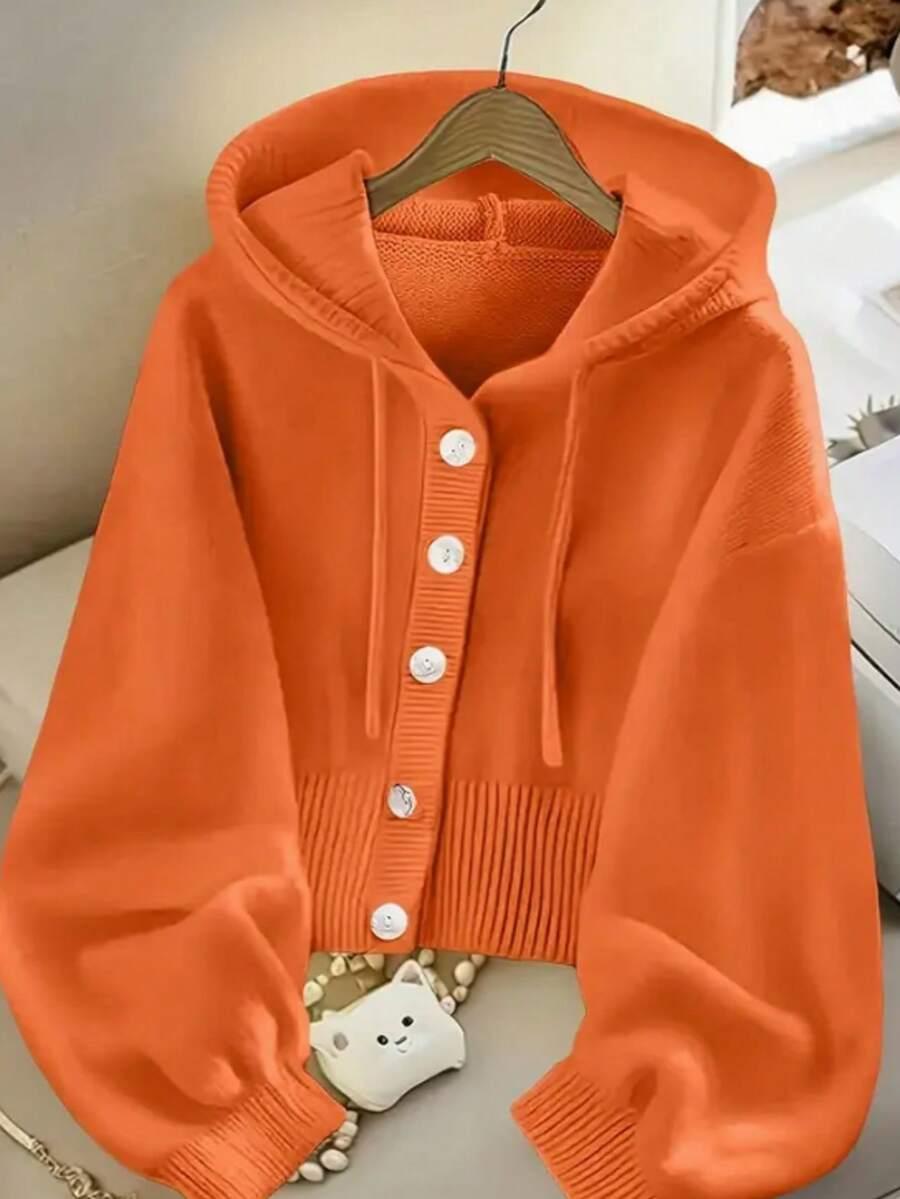pomarańczowy sweter z kapturem