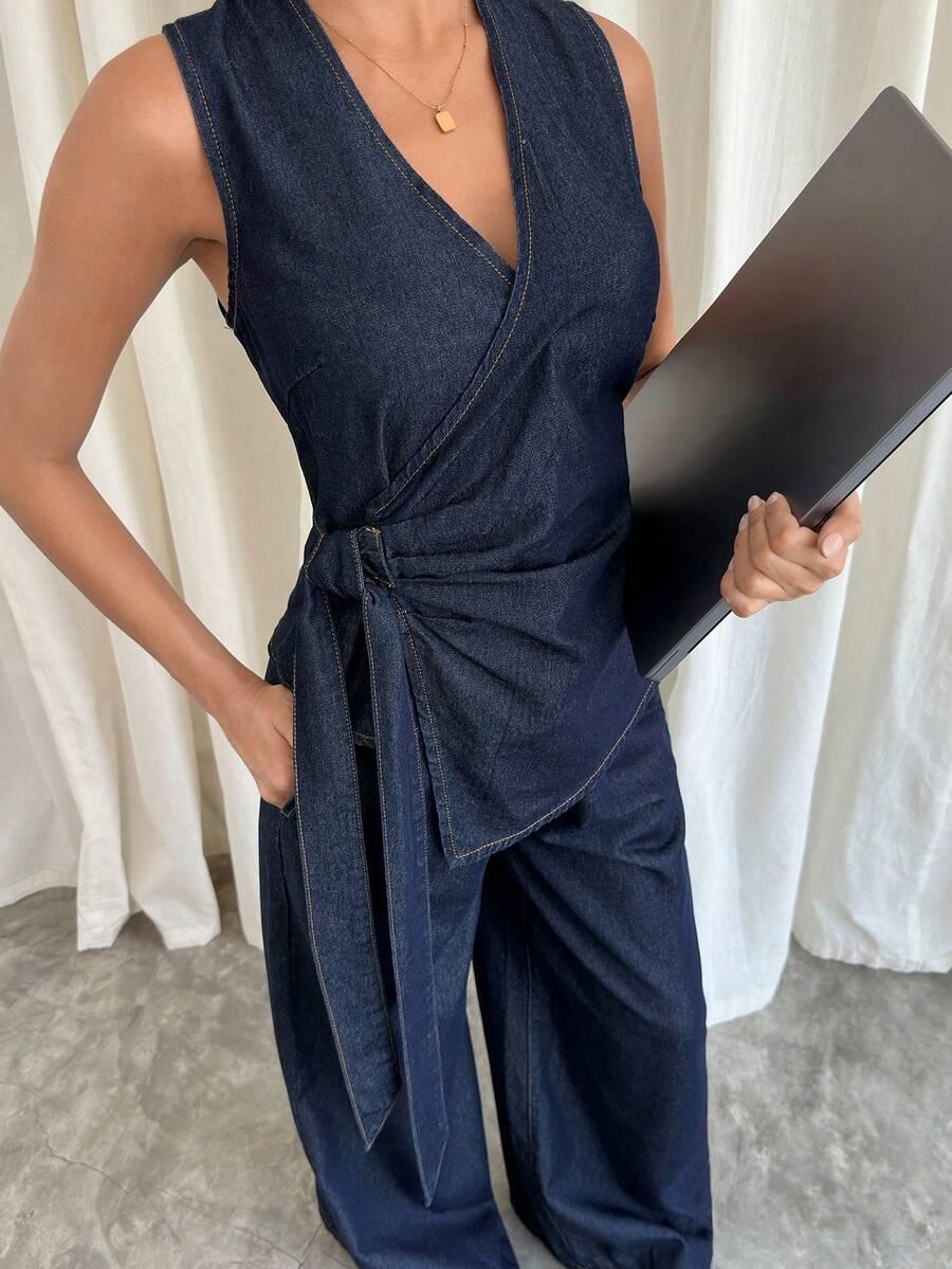 granatowy komplet bluzka spodnie jeans