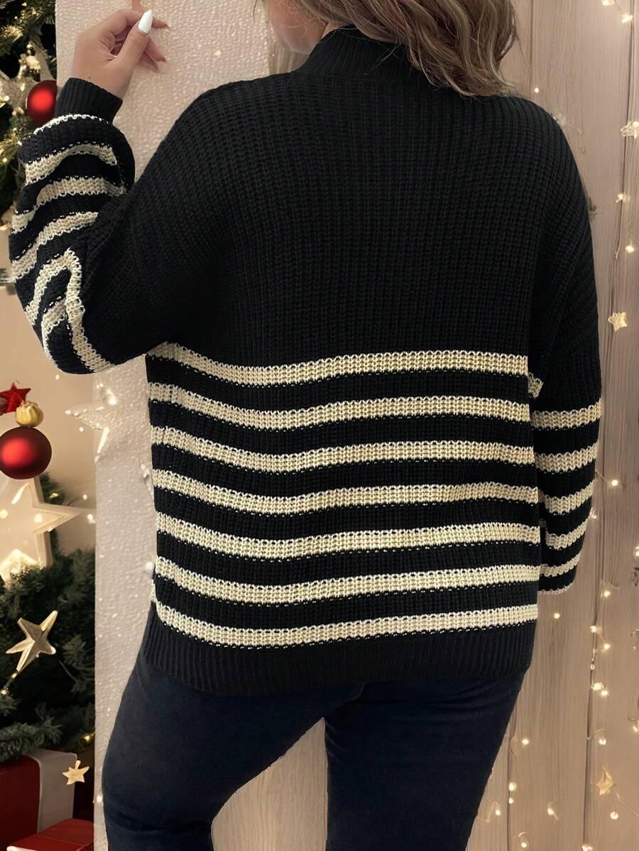 czarny sweter paski