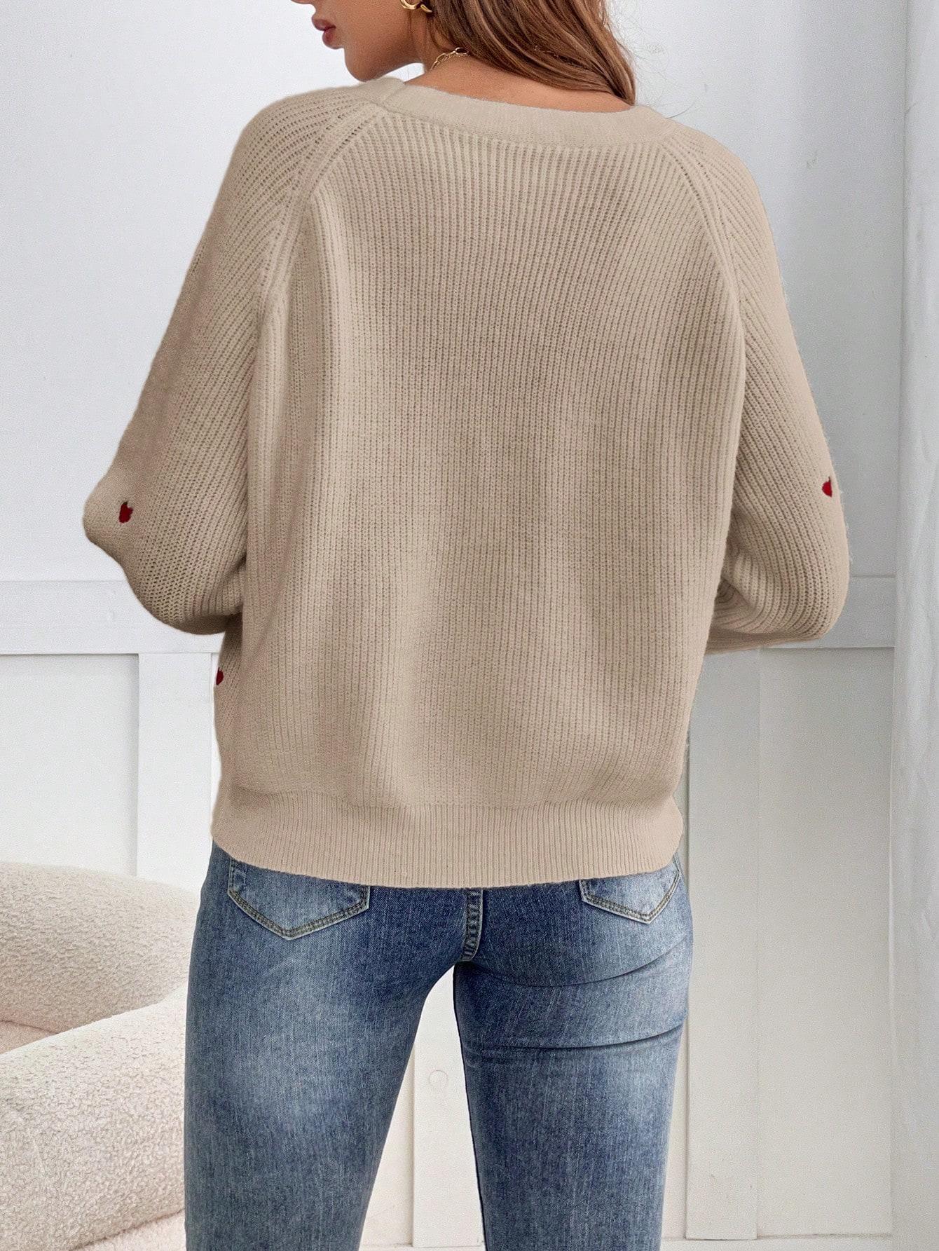 beżowy sweter guziki
