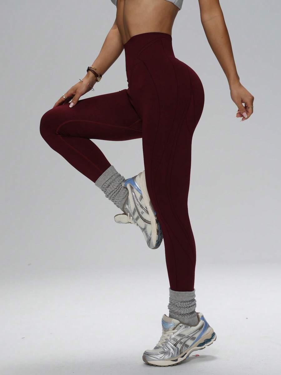 bordowe legginsy sportowe logo