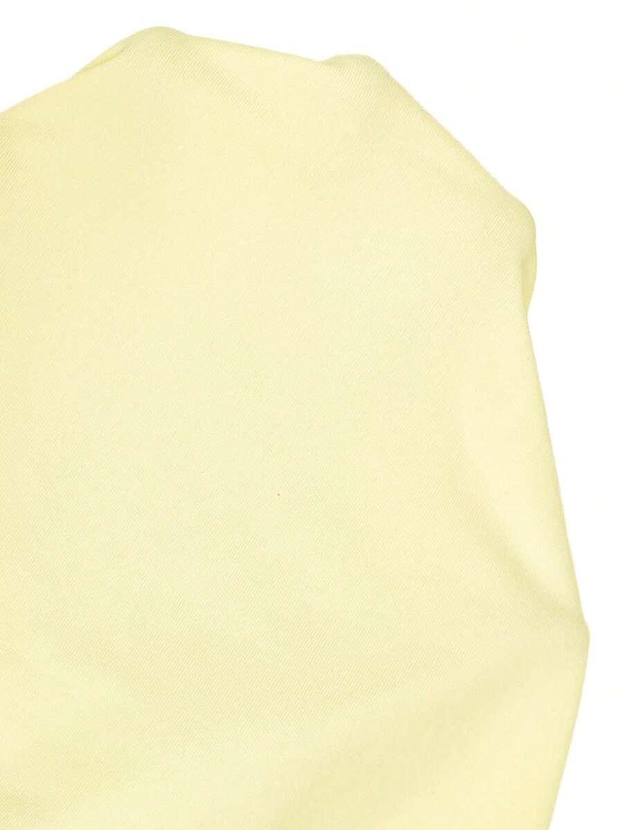 żółty top odkryte plecy