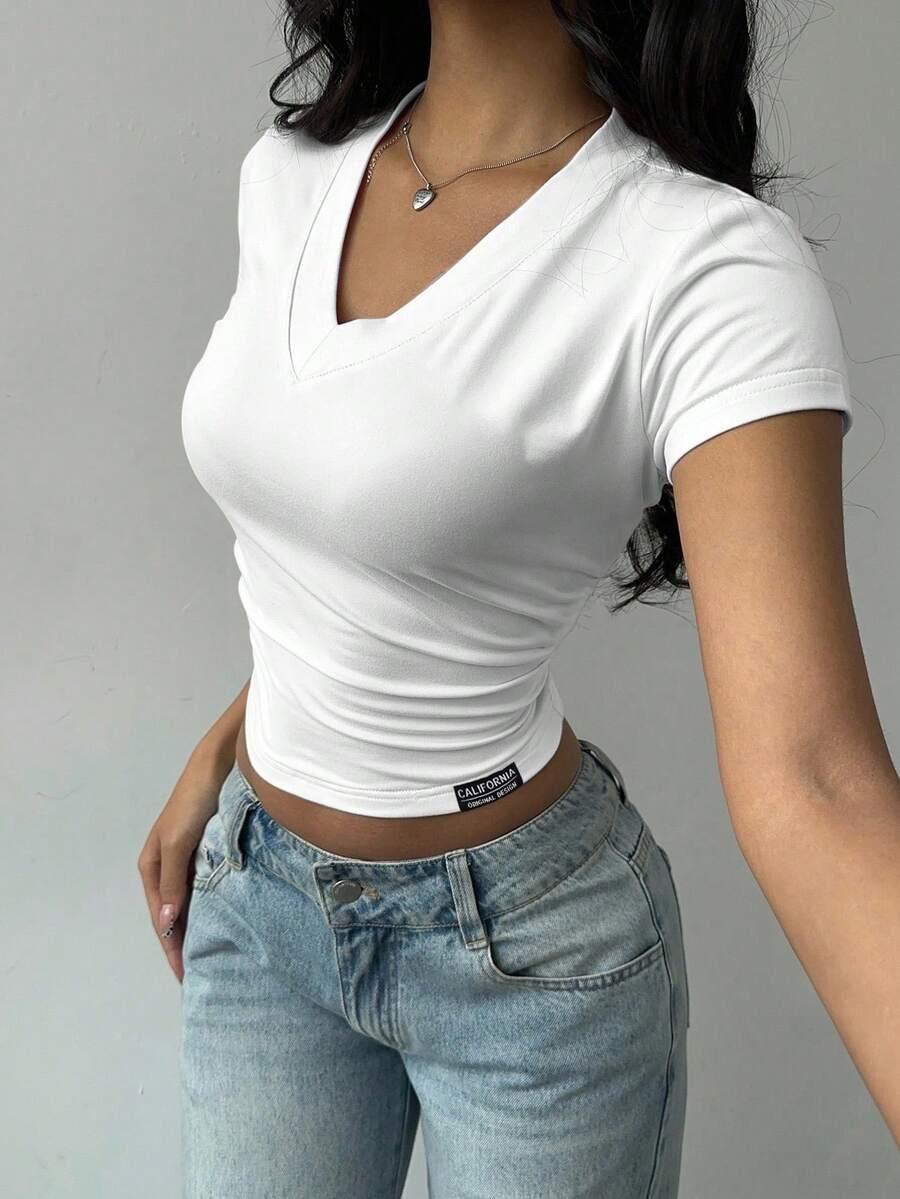 BIAŁA BLUZKA V-NECK