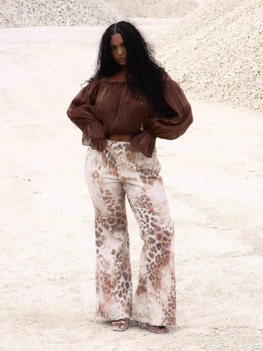 SPODNIE JEANS ANIMAL PRINT 