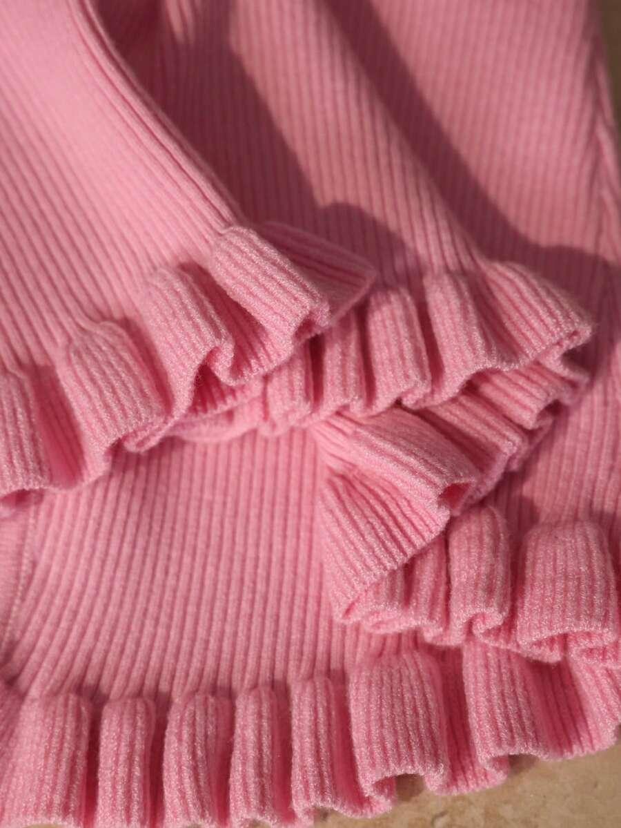 RÓŻOWY SWETER GUZIKI