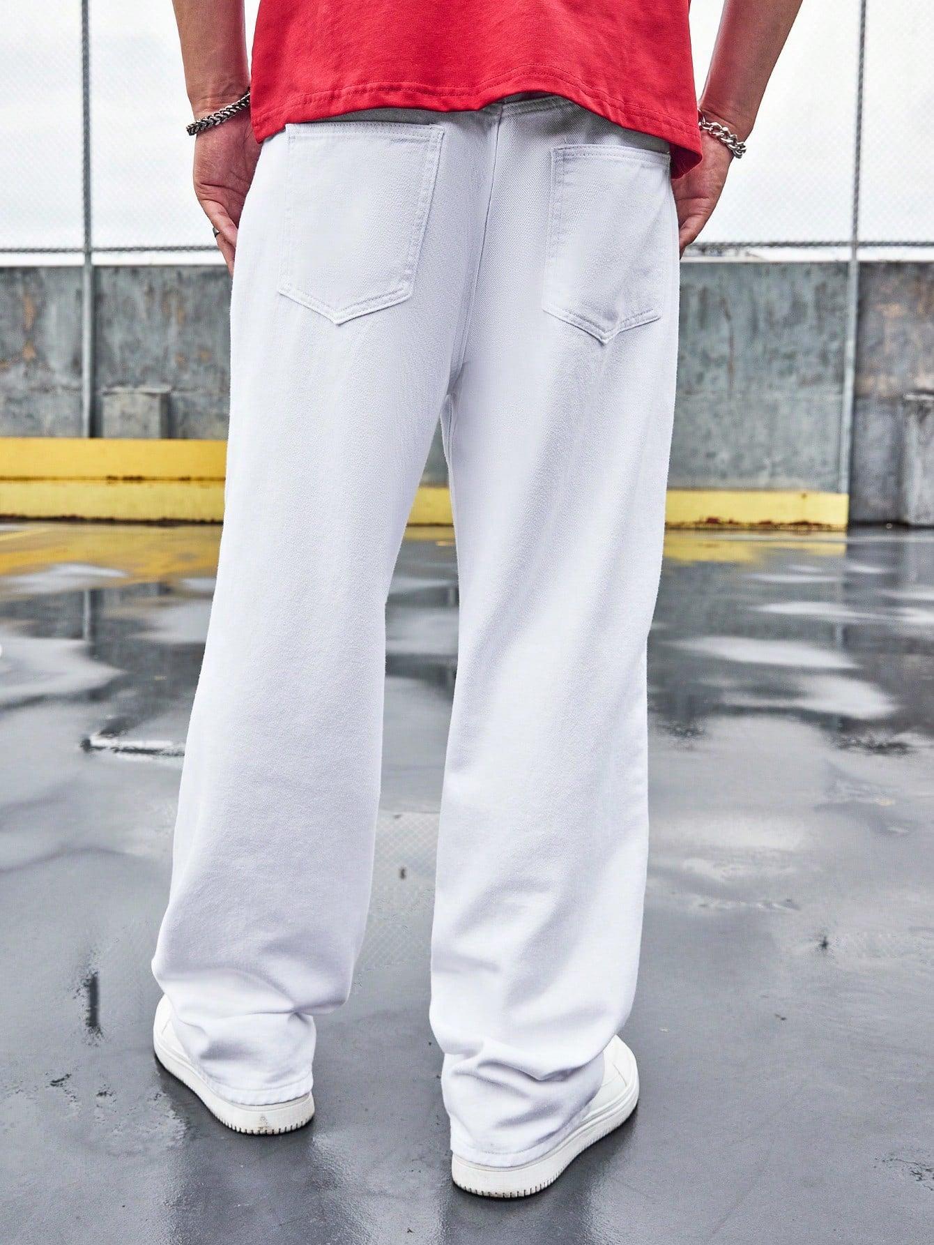 białe spodnie jeans zamek nadruk kieszenie