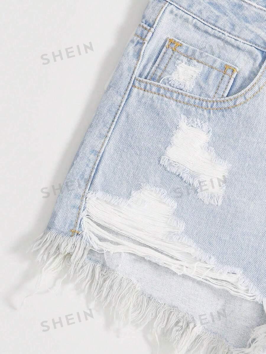 NIEBIESKIE SPODENKI JEANS PRZETARCIE 
