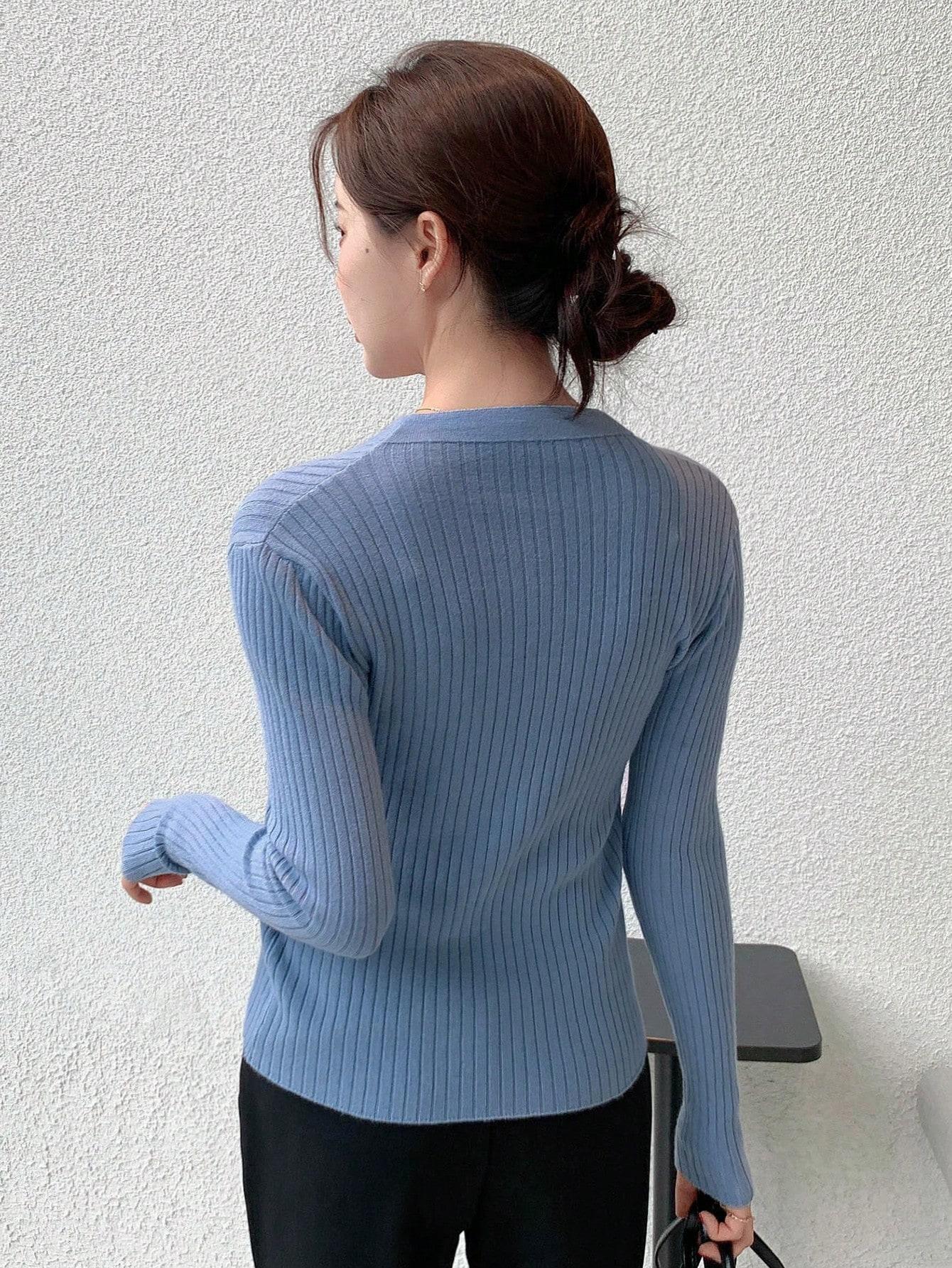 NIEBIESKI SWETER GUZIKI