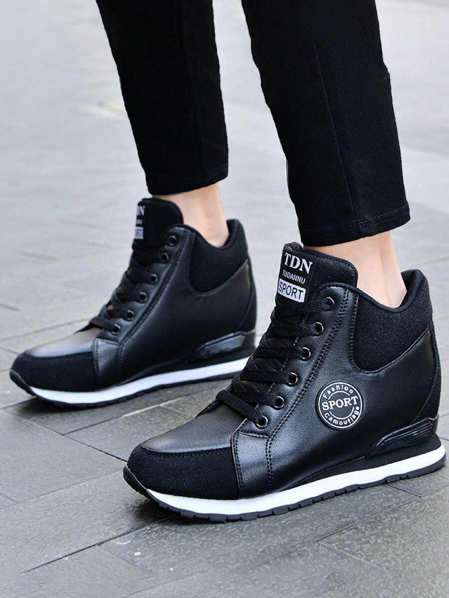 czarne buty sportowe na koturnie