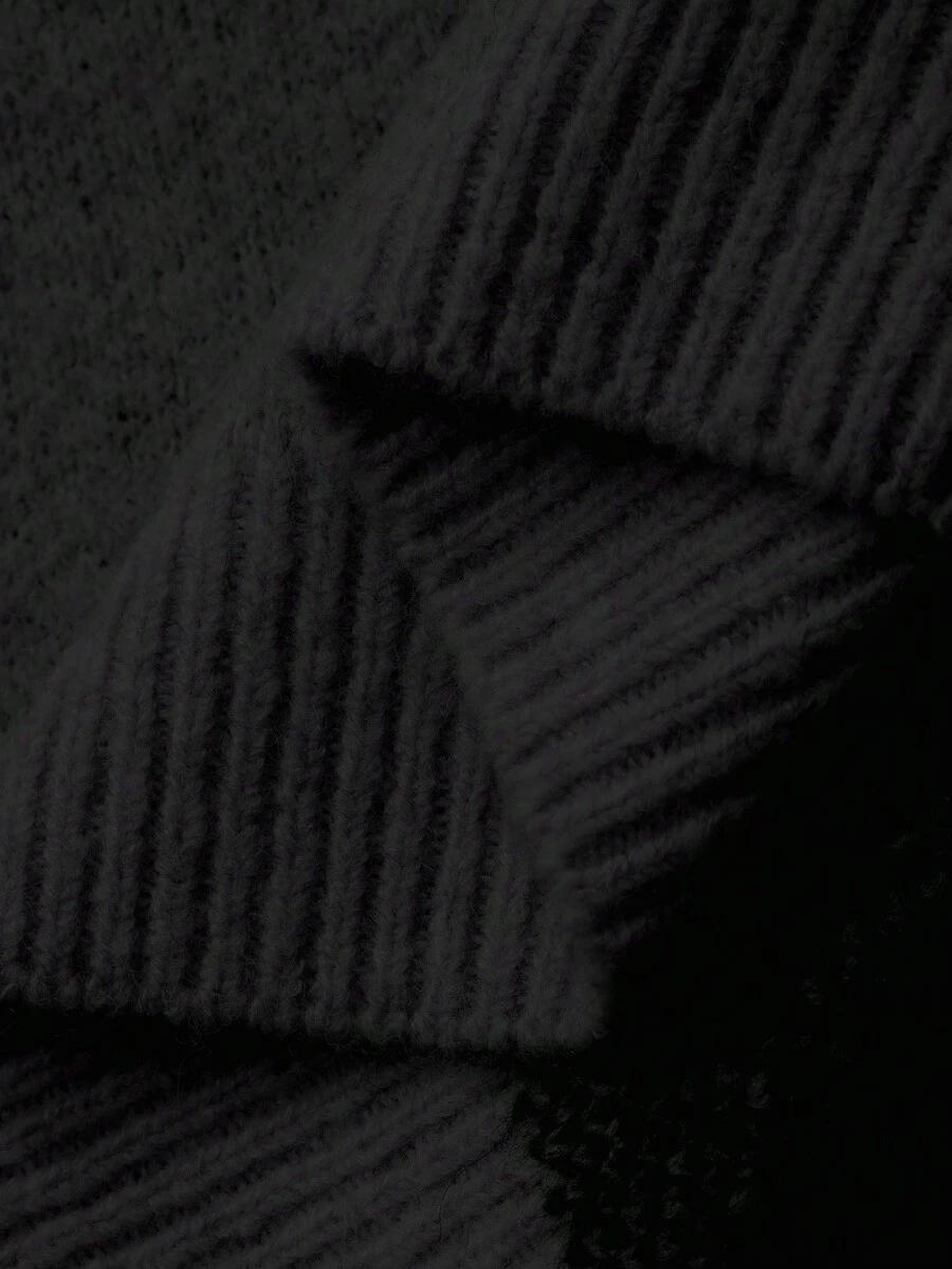 czarny sweter w groszki