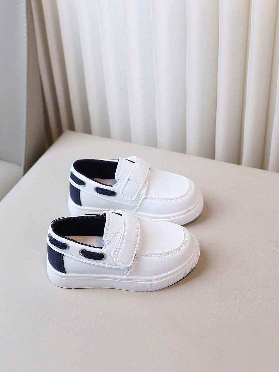 białe sportowe buty rzep