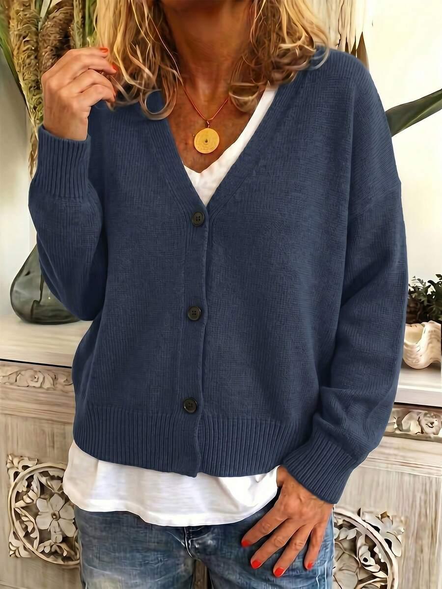 granatowy sweter guziki
