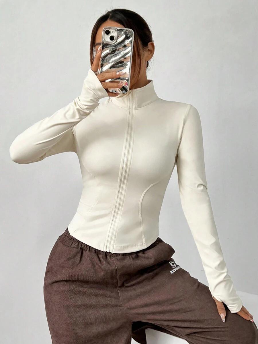 KREMOWA BLUZA ZAMEK