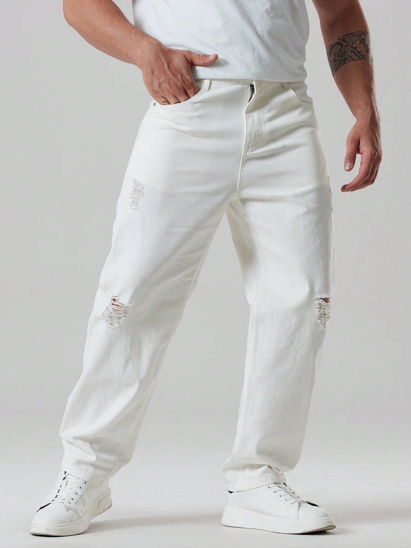 białe jensowe spodnie przetarcia