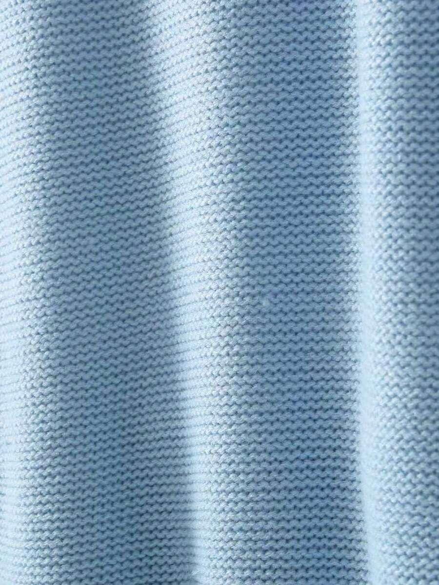 niebieski sweter oversize