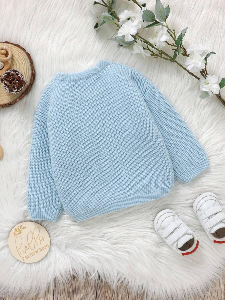 niebieski sweter haft