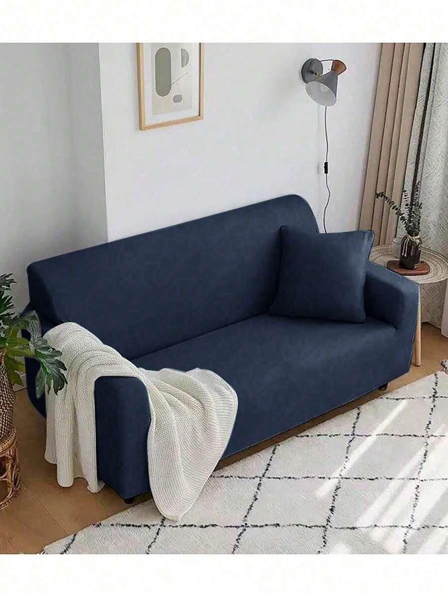 granatowy pokrowiec na sofę