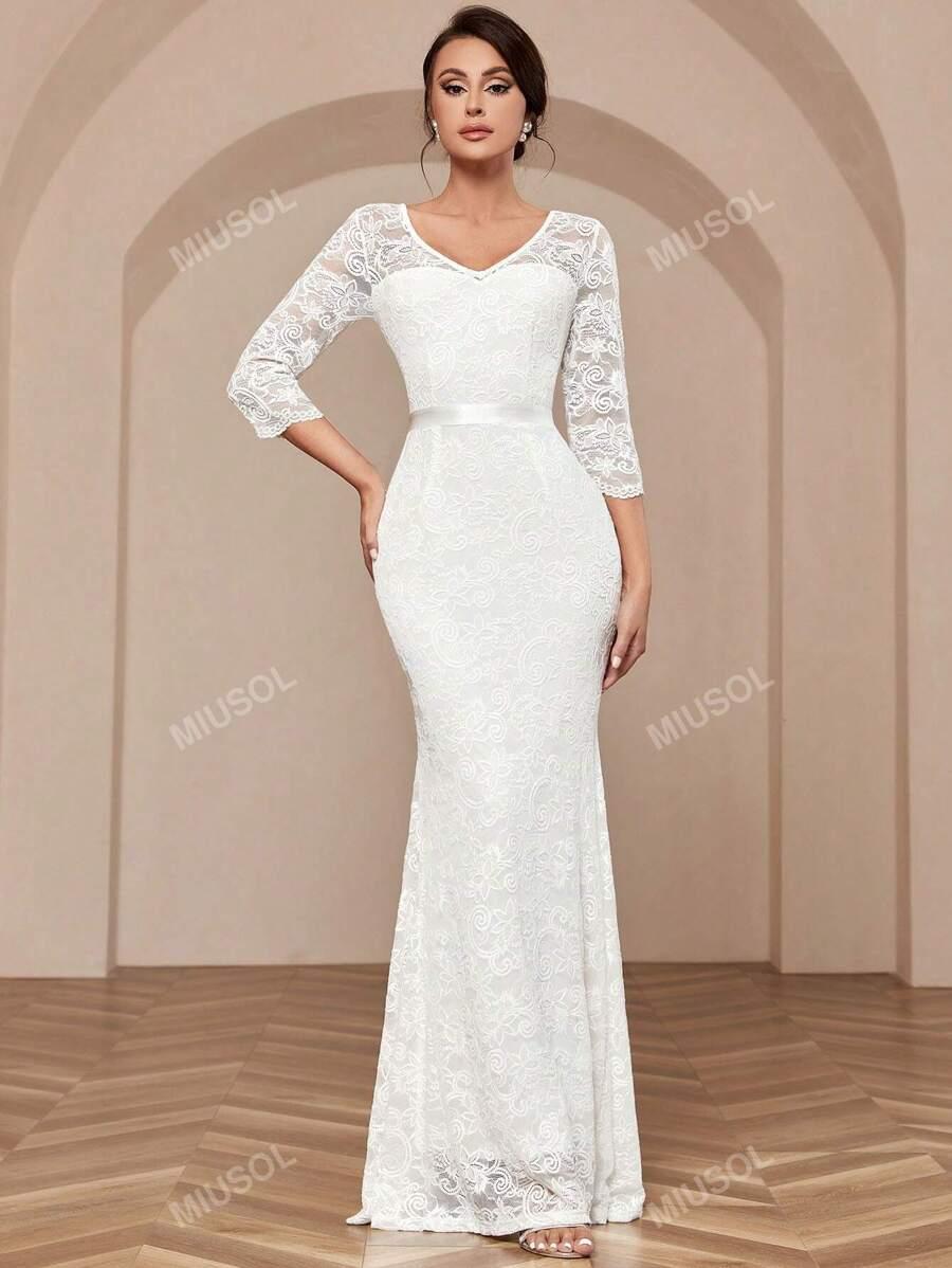 SUKNIA ŚLUBNA KORONKA