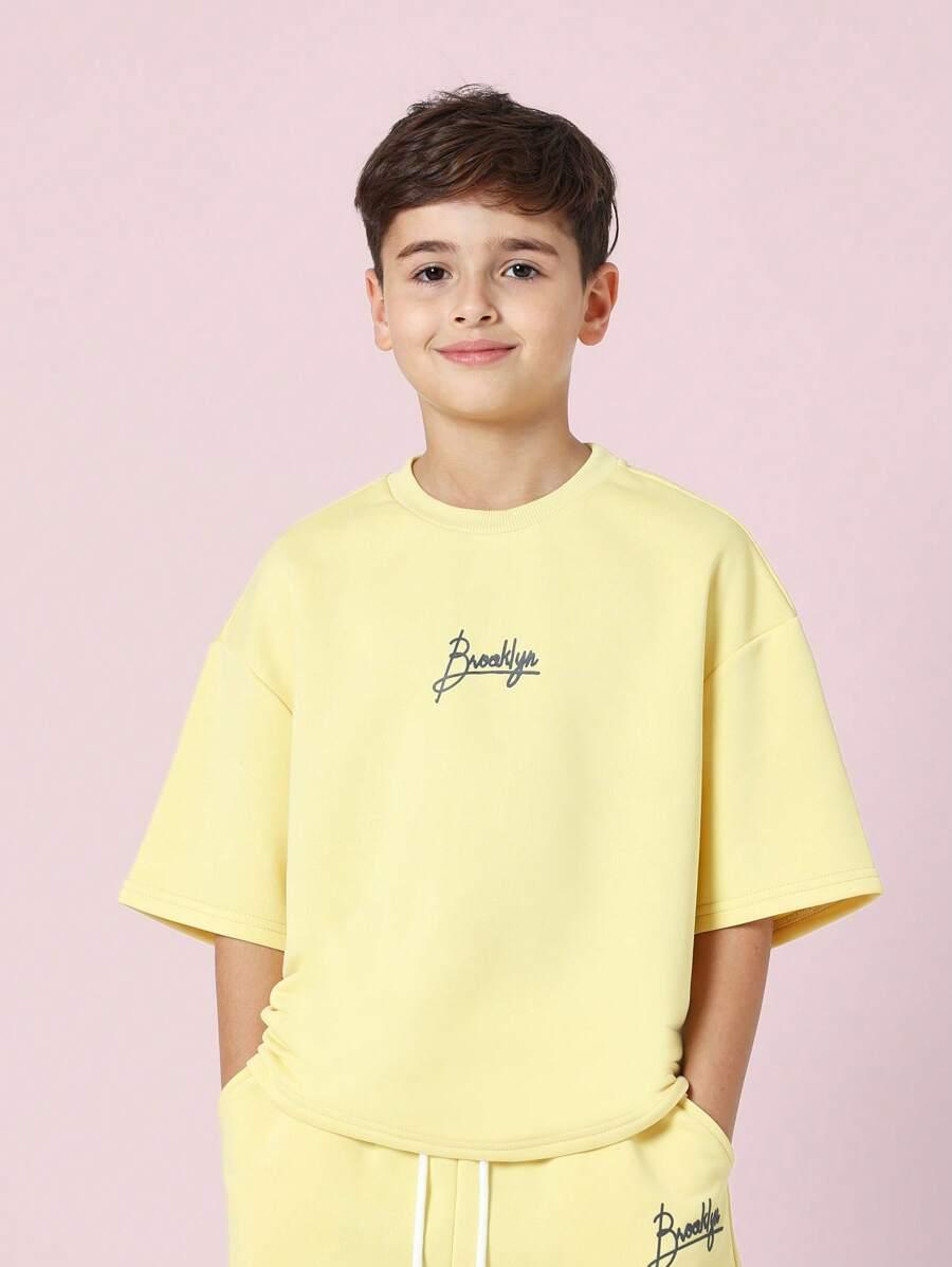 żółty komplet t-shirt spodenki.