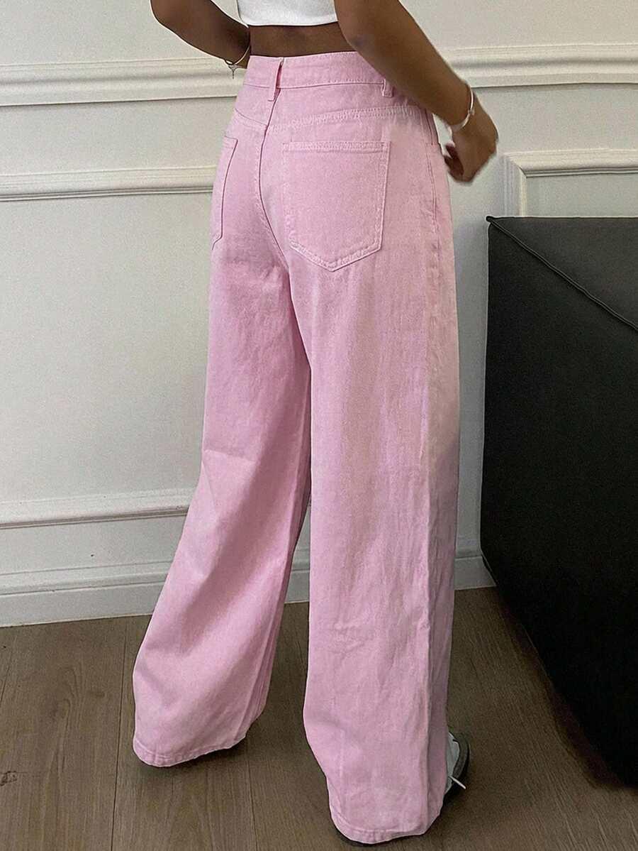 różowe spodnie jeans zamek