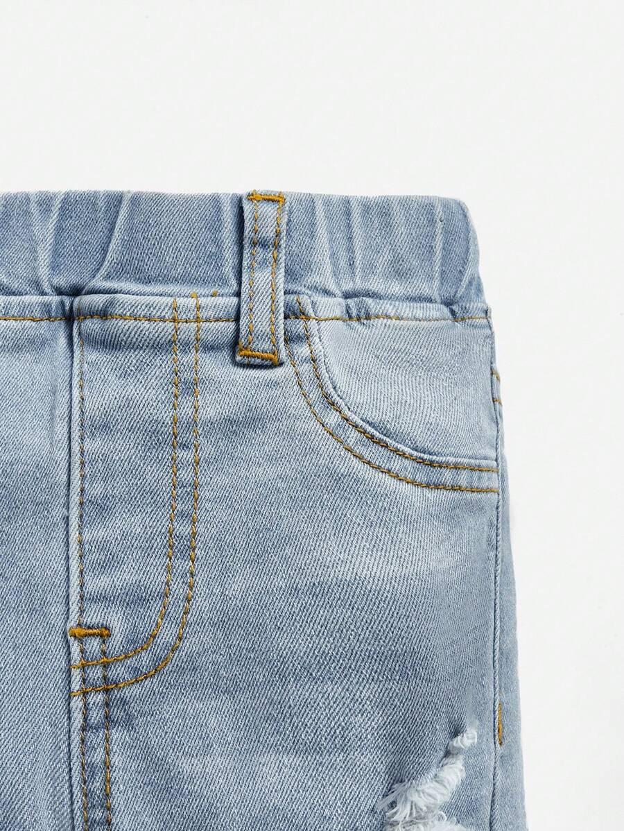 niebieskie spodnie jeans 