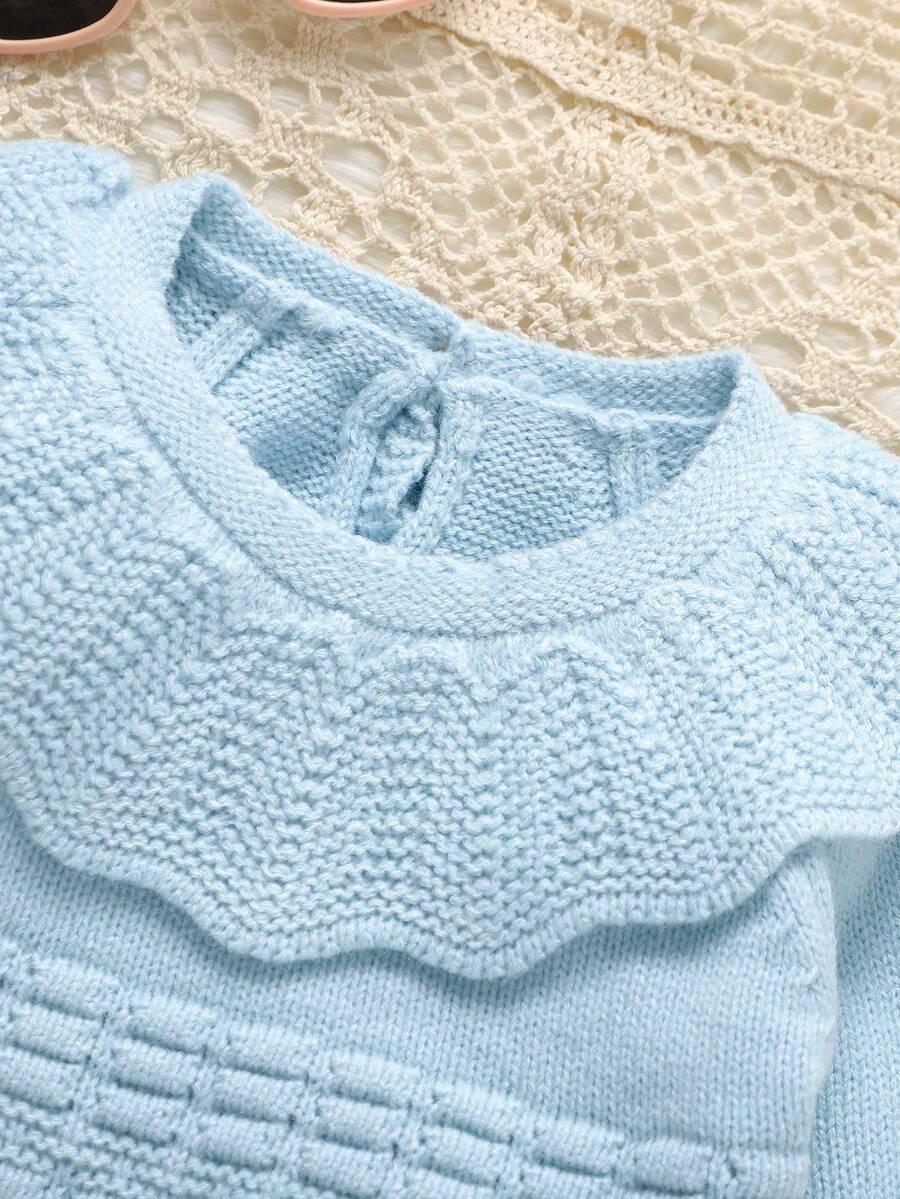 niebieski komplet sweter spodnie
