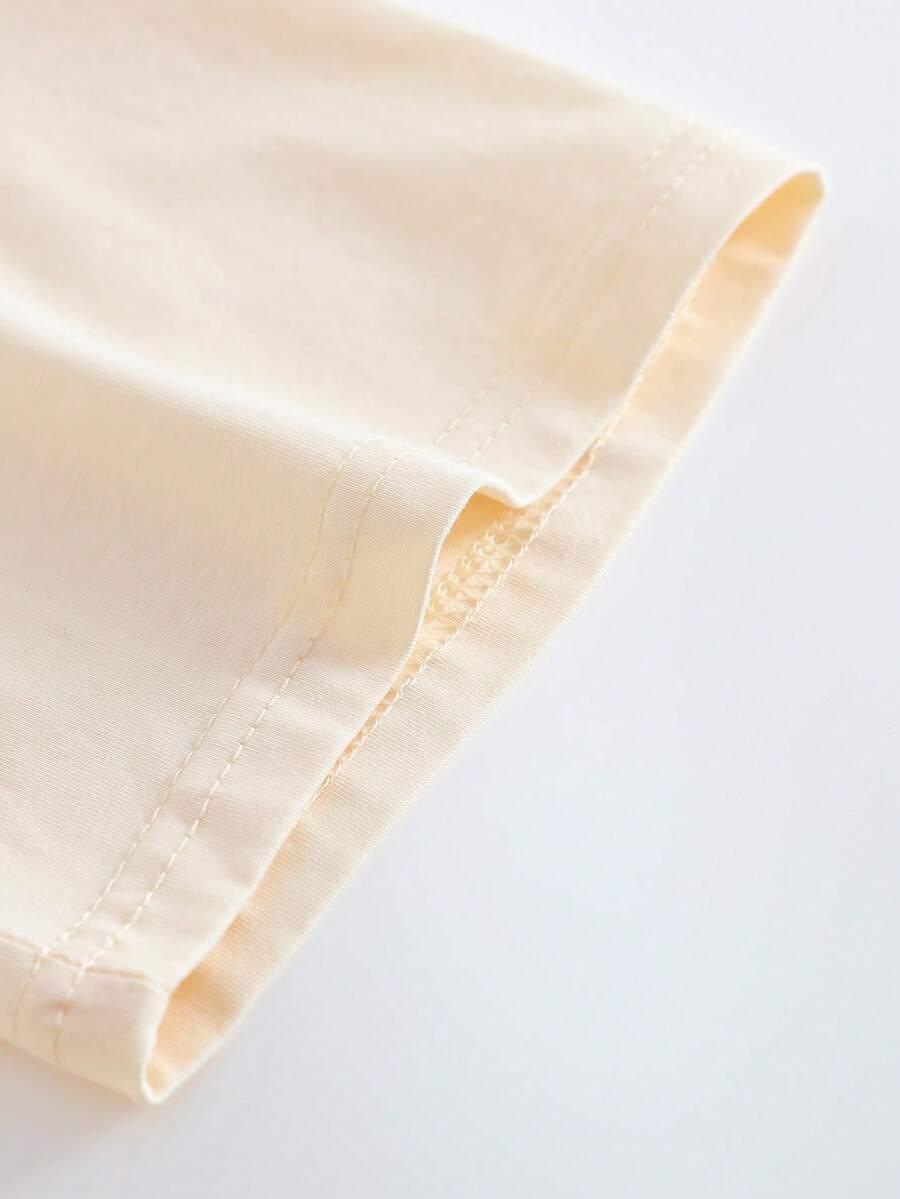 beżowy t-shirt nadruk