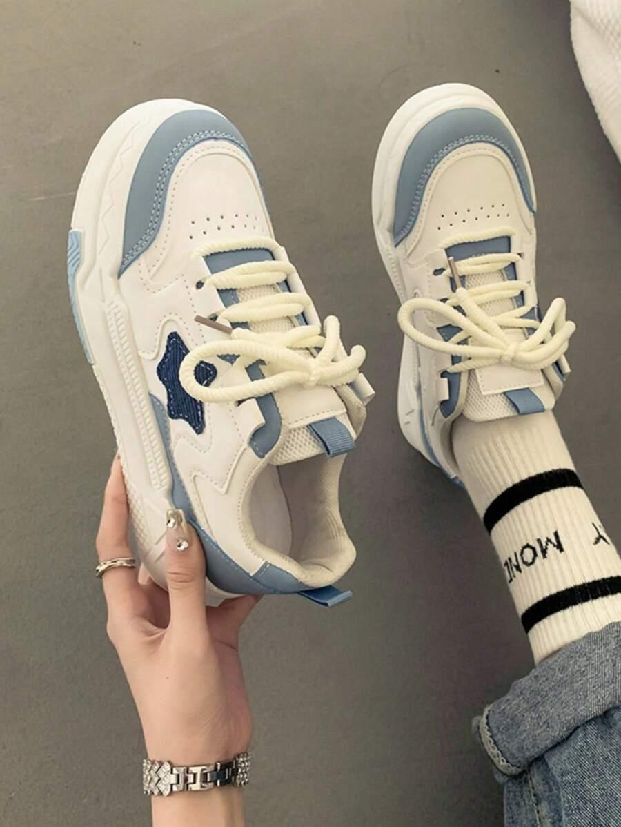 sznurowane buty sportowe