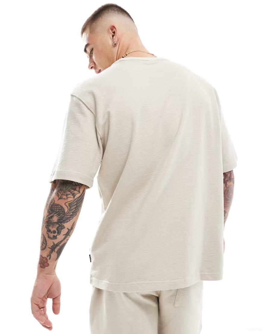 beżowy t-shirt tekstura