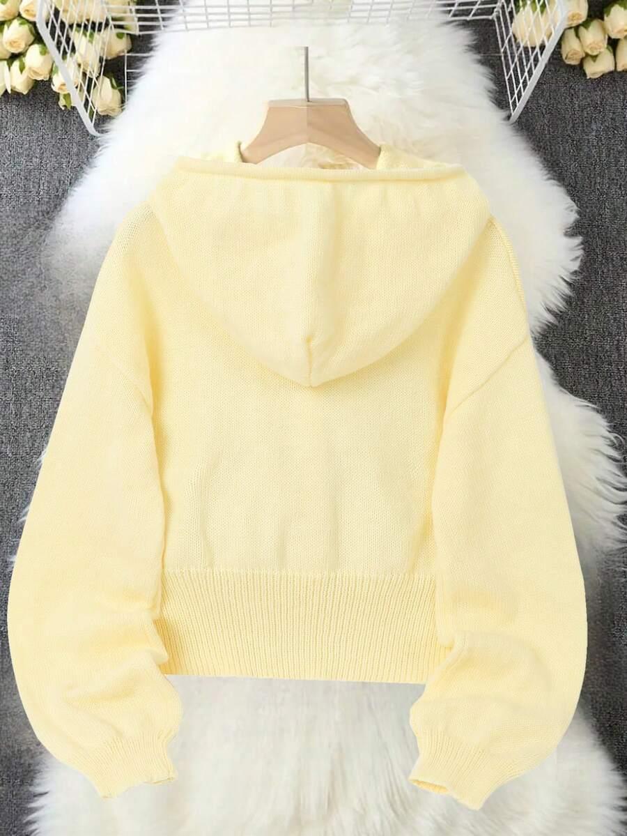 żółty sweter kaptur
