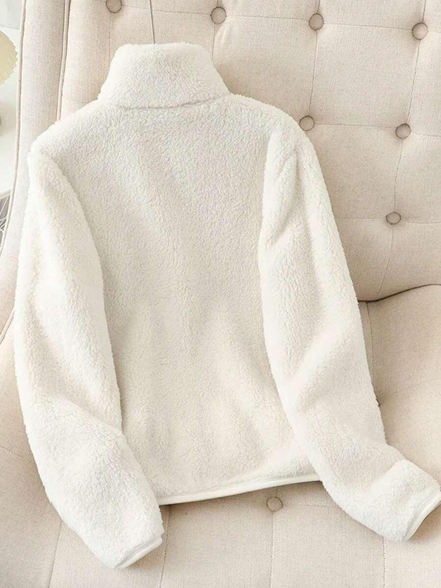 KREMOWA BLUZA ZAMEK