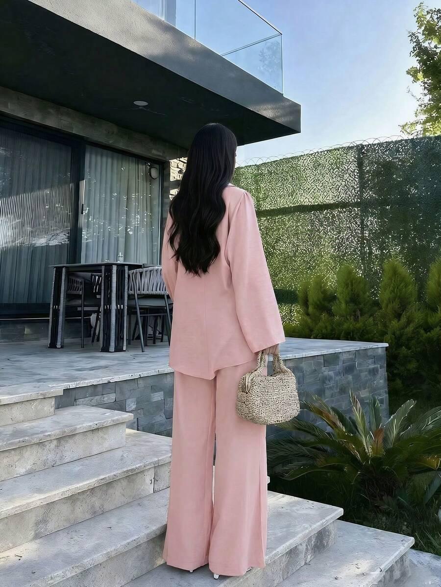 różowa bluzka spodnie komplet