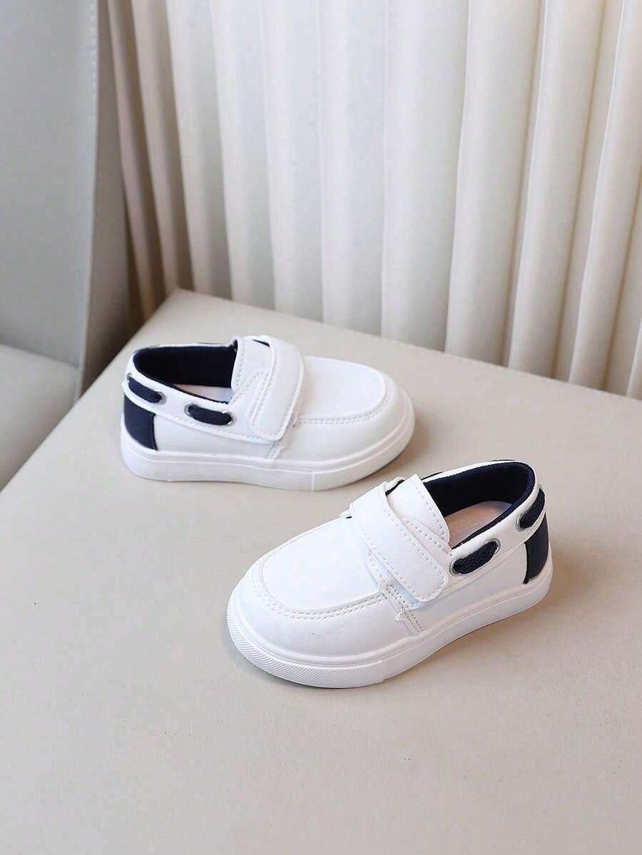 białe sportowe buty rzep