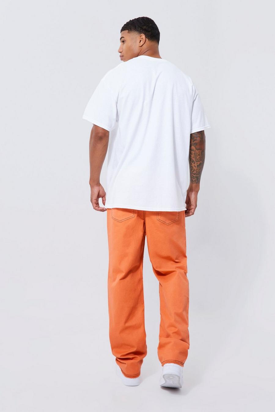 pomarańczowe spodnie kontrastowe szwy casual