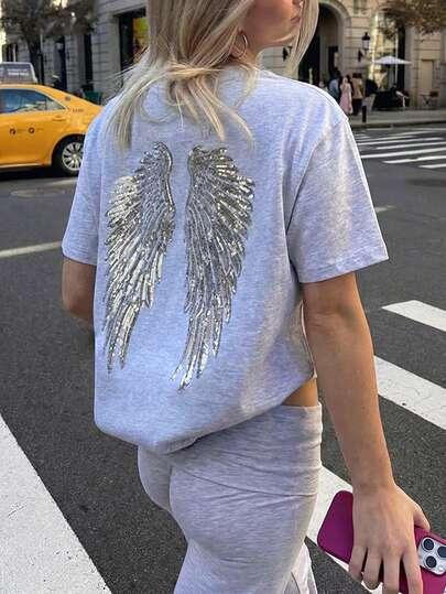 T-SHIRT Z APLIKACJĄ Z CEKIN 