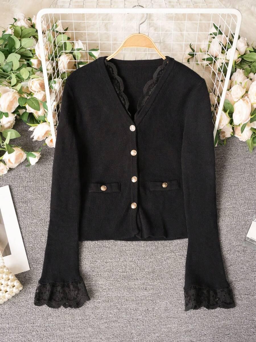 czarny sweter guziki