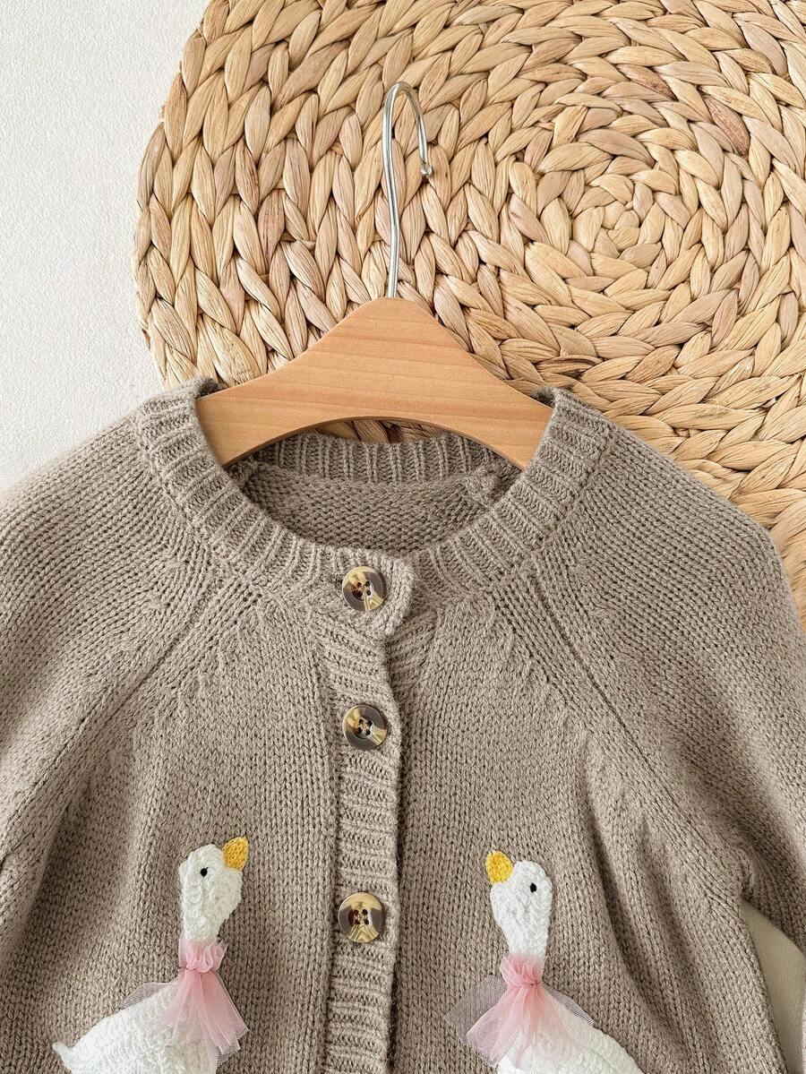 beżowy sweter guziki