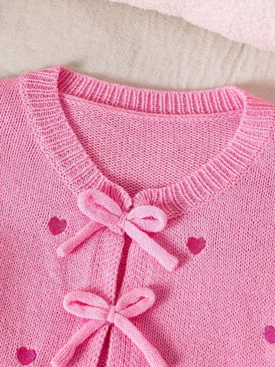różowy sweter wiązanie