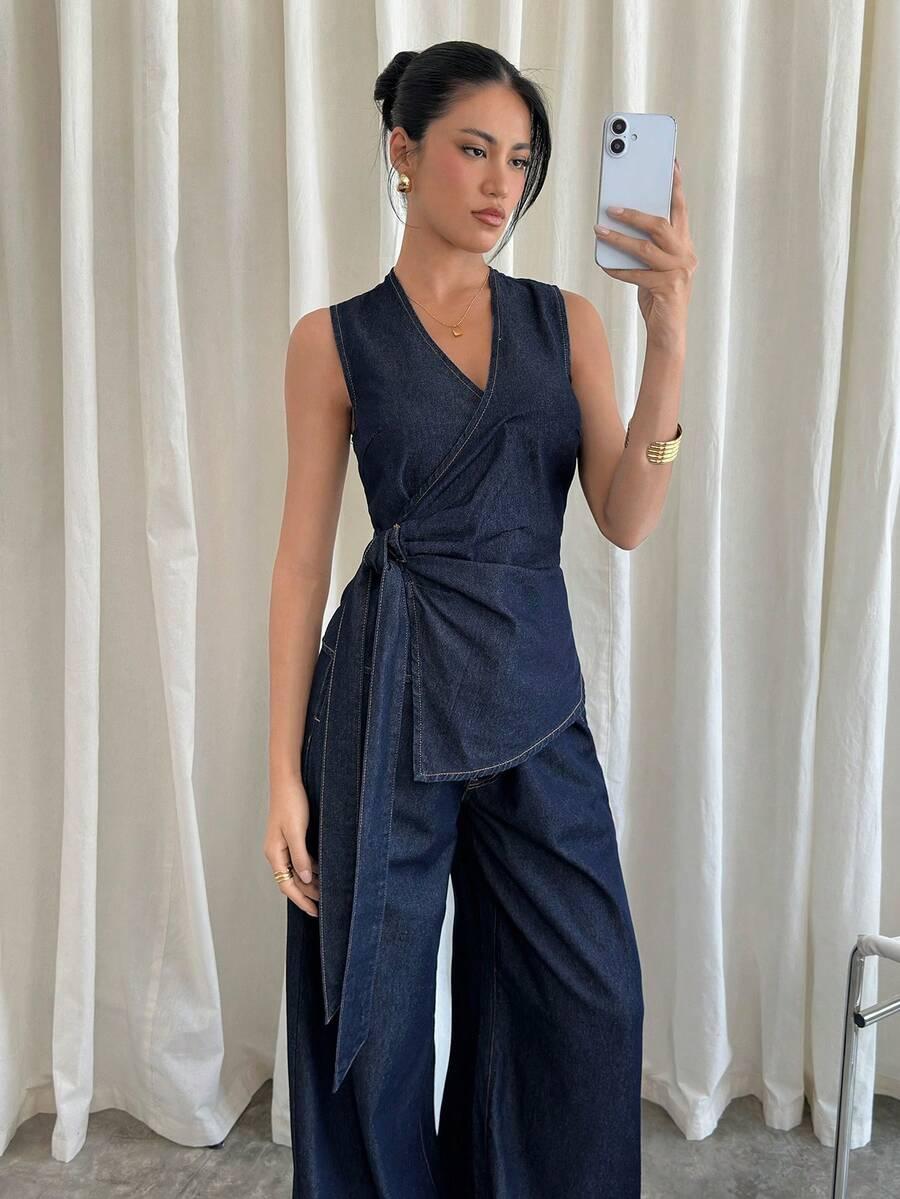 granatowy komplet bluzka spodnie jeans